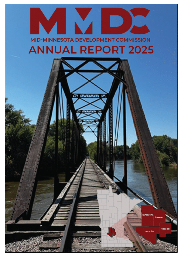 Annual report cover page that shows an older railroad trestle bridge. The top of the page shows the MMDC logo in a dark red with annual report under it. A map of the state of Minnesota with MMDC's four county region highlighted can be found in the bottom right corner.